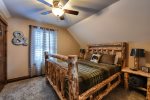  Gold Camp Lodge bedroom with Queen log Bed. 